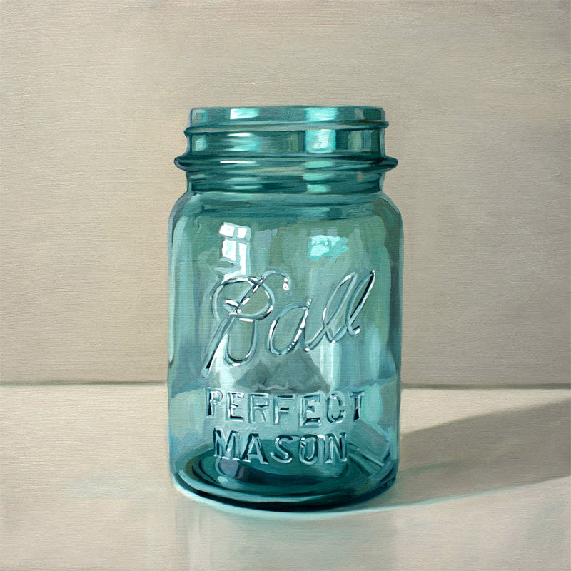 Vintage Turquoise Jar Fine Art Print by Lauren Pretorius: a classic vintage blue glass jar on a light reflective surface.