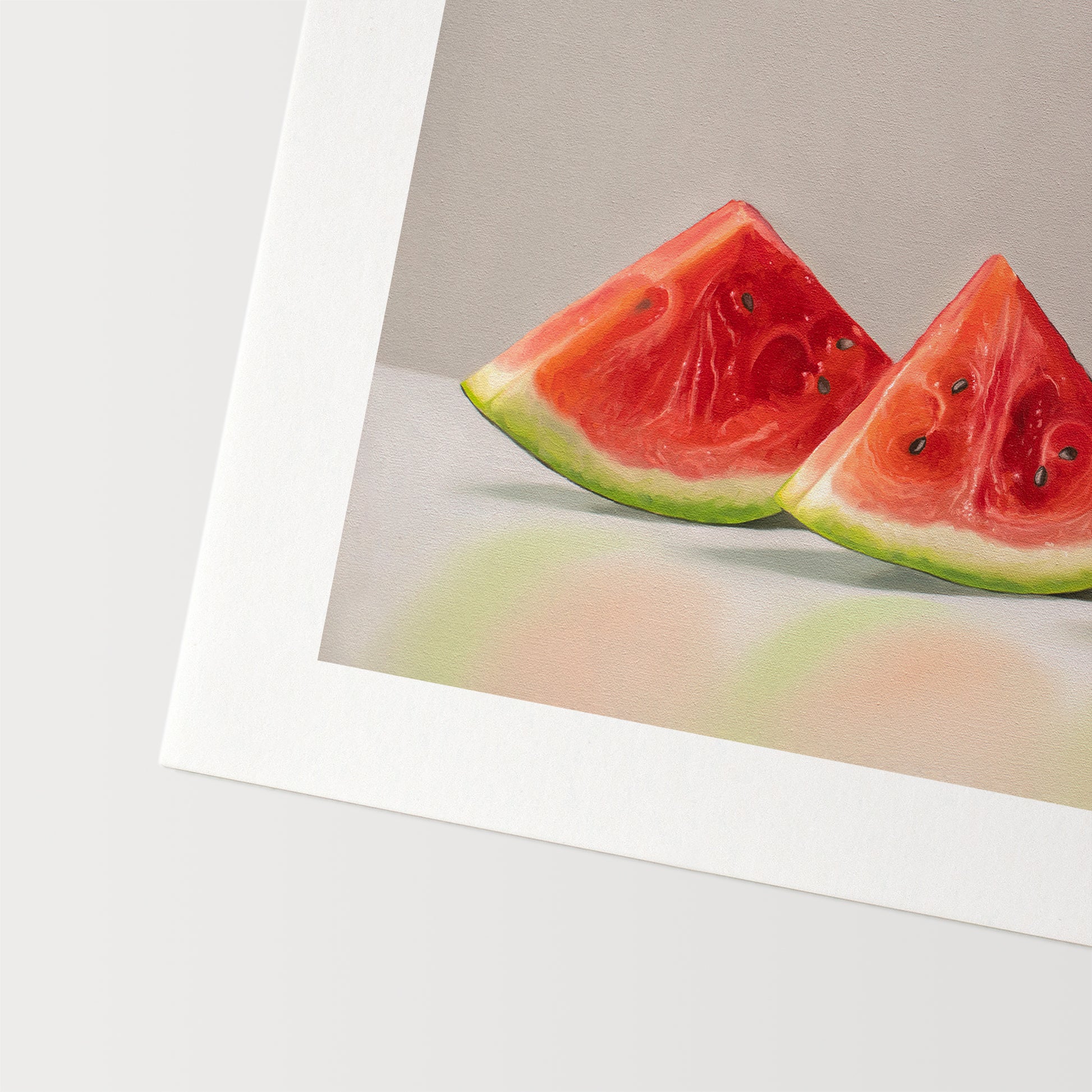 Watermelon Slice Trio Fine Art Print by Lauren Pretorius: a freshly sliced trio of watermelon wedges lined up on a reflective surface with some nice dramatic lighting.