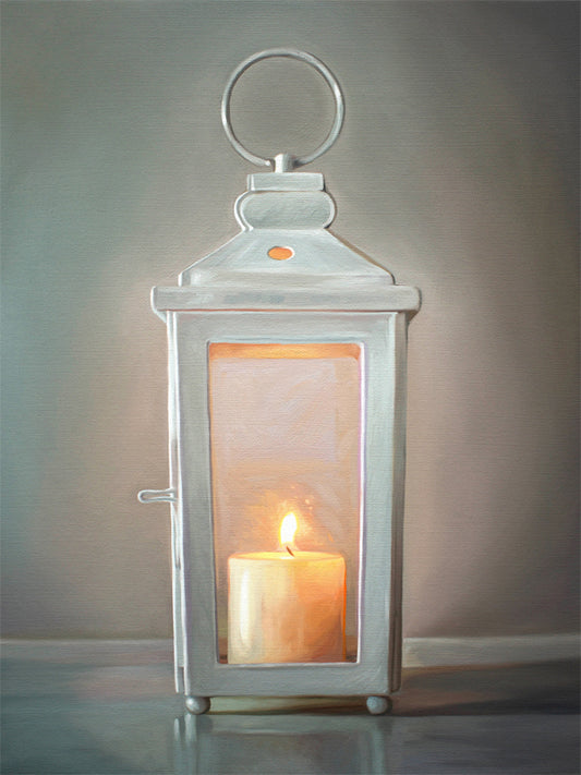 White Candle Lantern Fine Art Print by Lauren Pretorius: a white lantern with a lit candle glowing on the inside.
