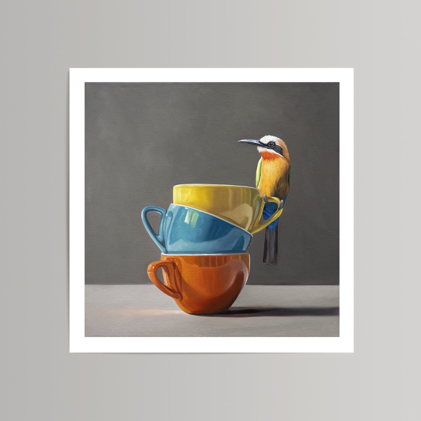 Art print of a colorful bee-eater bird perched on a stack of yellow, blue, and orange cups.