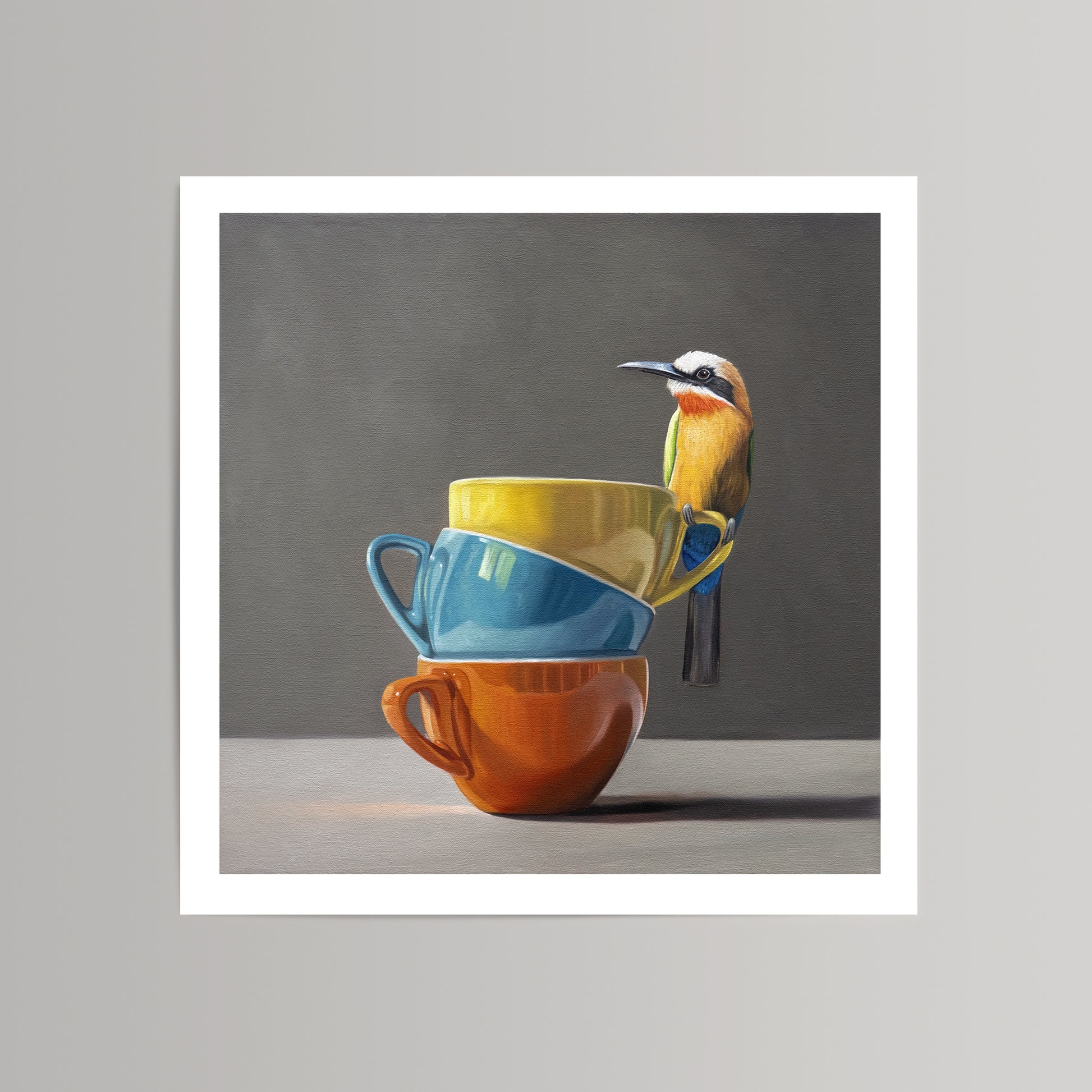 Art print of a colorful bee-eater bird perched on a stack of yellow, blue, and orange cups.