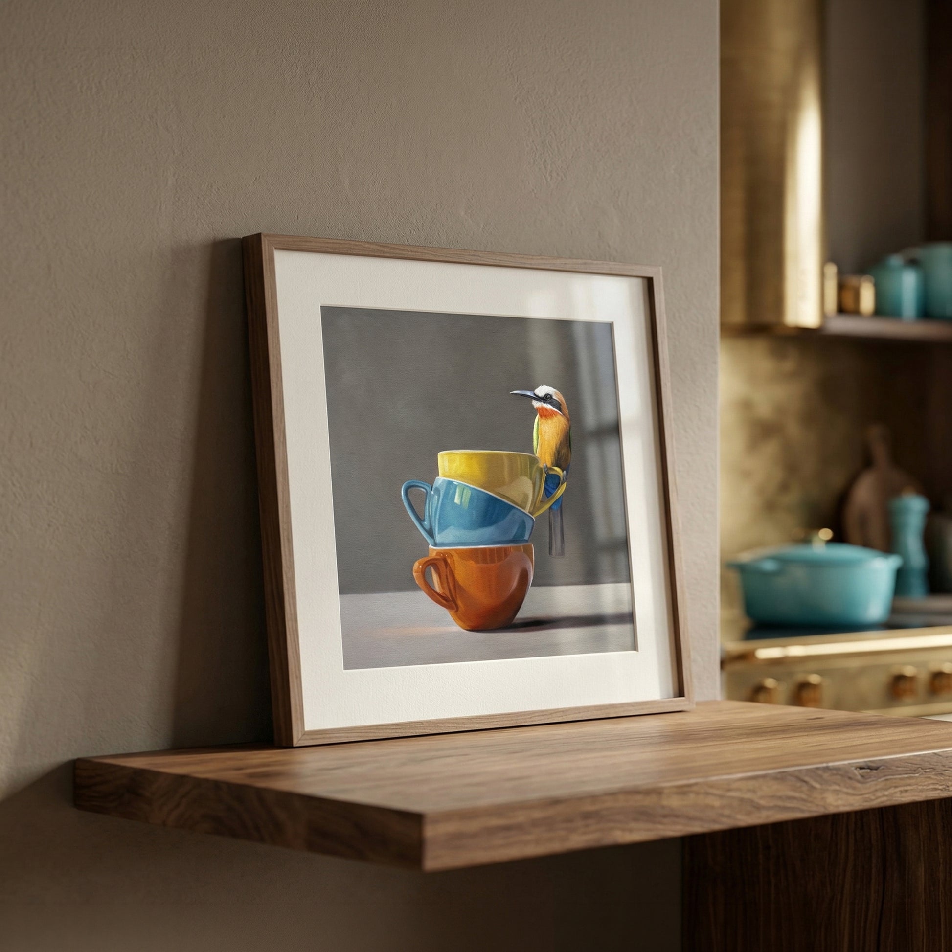 Framed fine art print of a White Fronted Bee Eater perched on stacked yellow, blue, and orange cups.